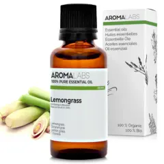Aceite esencial de Lemongrass, ideal como aceite repelente de mosquitos. Botella de vidrio ámbar con etiqueta blanca y tallos de hierba limón.